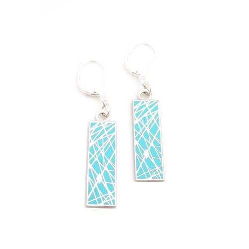 Light blue enamel earrings with pattern of interesecting lines