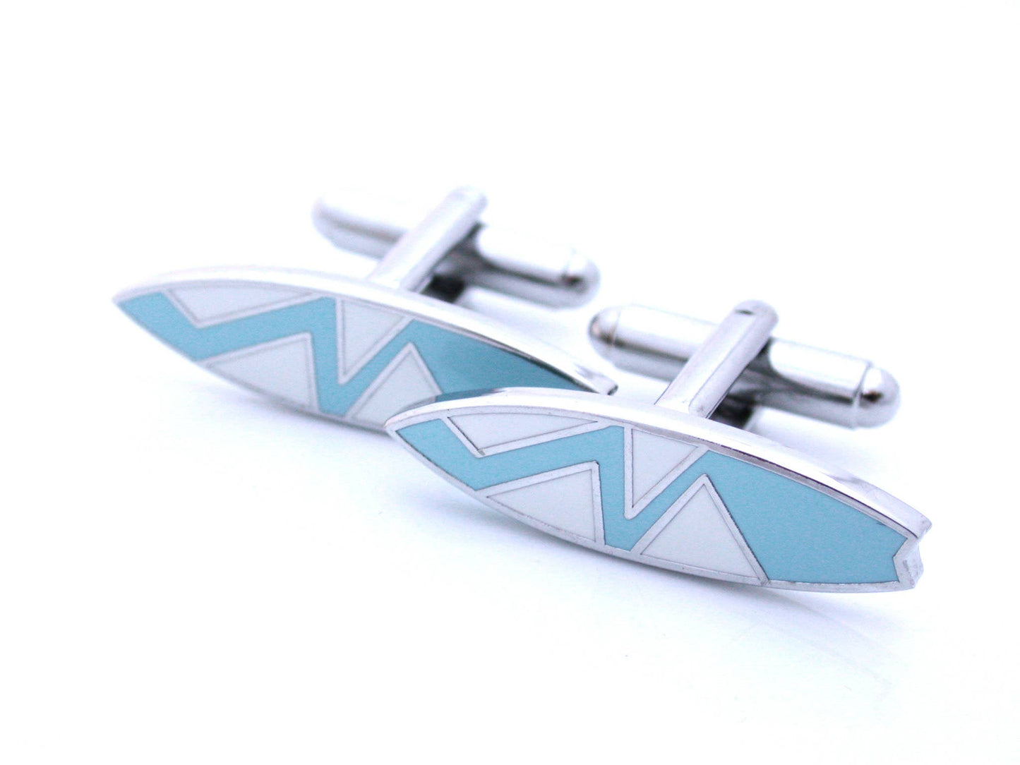 Surfboard-shaped cufflinks in blue enamel with a zigzag pattern.