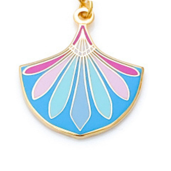 Colorful fan-shaped pendant with gold trim on a white background