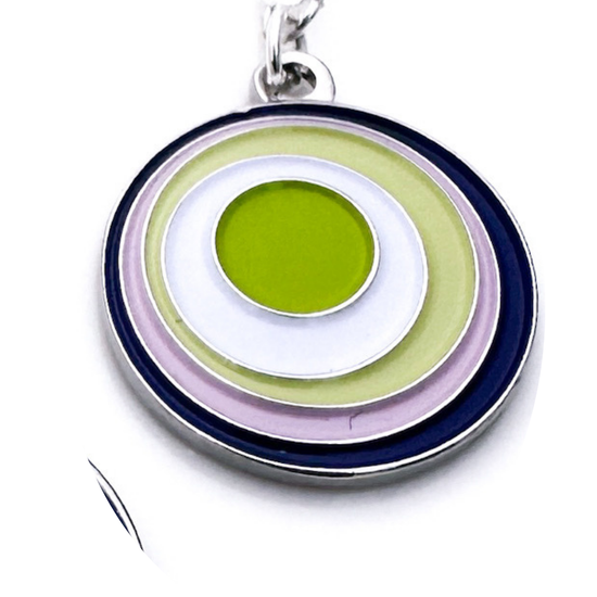 Multicolored circular pendant on a white background