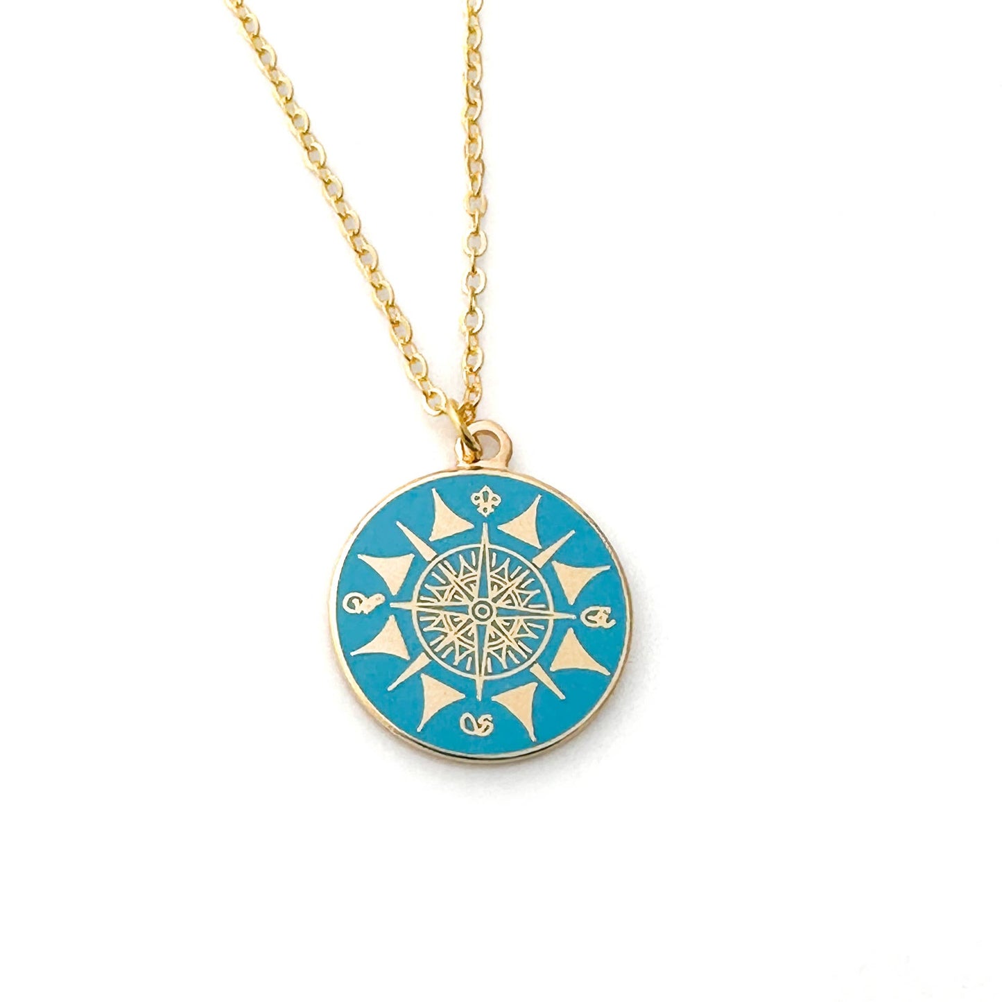 delicate compass charm necklace in gold finish