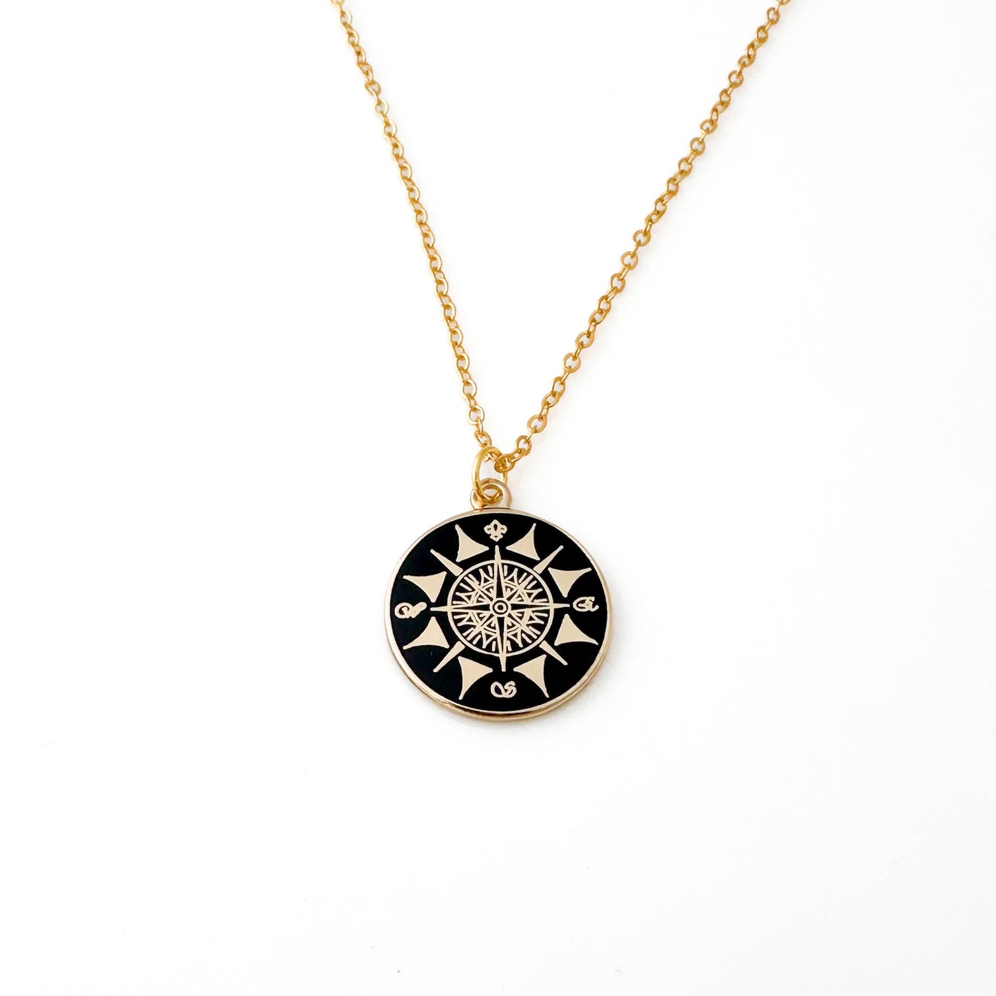 delicate compass charm necklace in gold finish