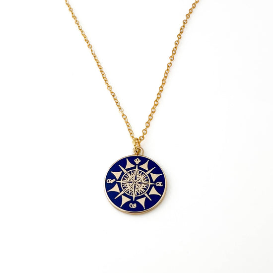 delicate compass charm necklace in gold finish