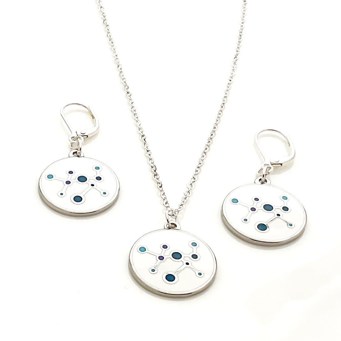 Jewelry set with circular enamel pendants and a necklace inspired in MIT museum