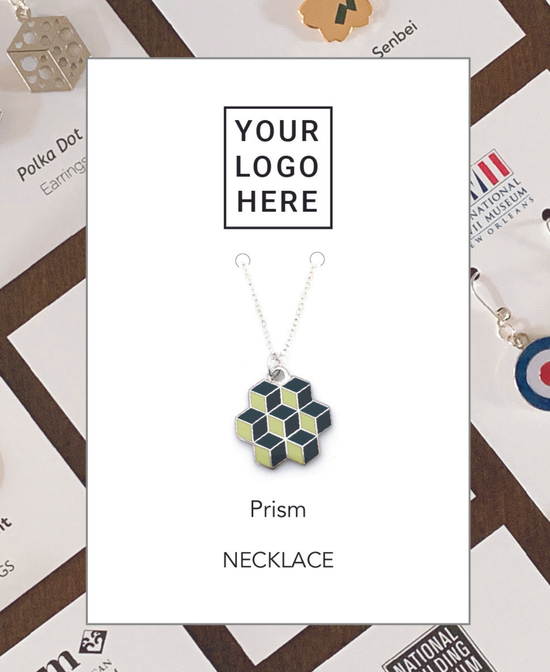 Necklace with a geometric pendant on a white card with 'Your Logo Here' text, surrounded by other jewelry items.