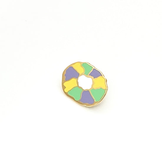 Colorful donut-shaped object on a white background