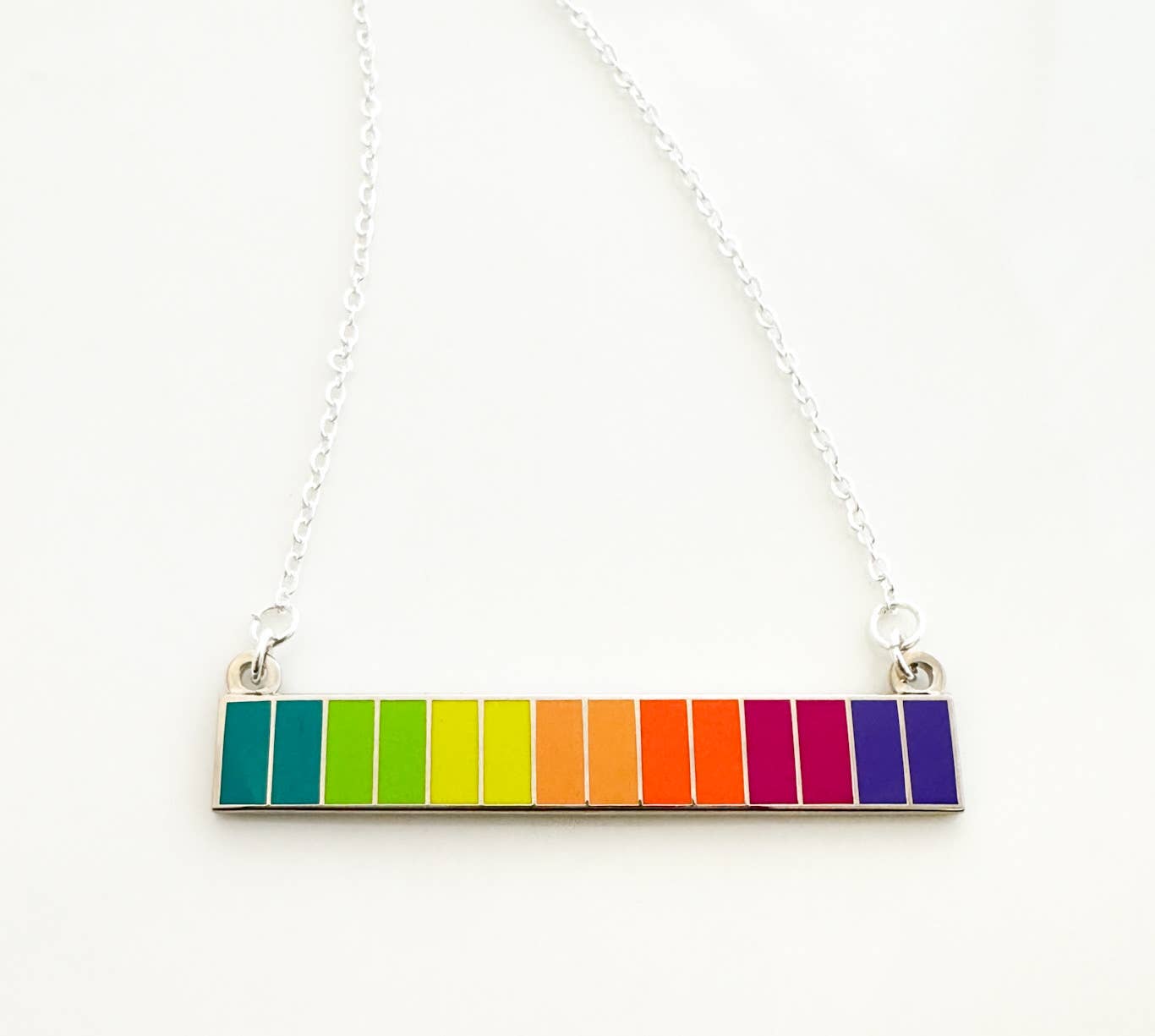 silver necklace in rainbow