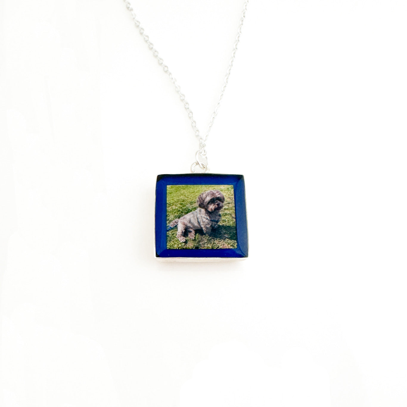 Necklace with a square pendant featuring an image of a dog on a white background