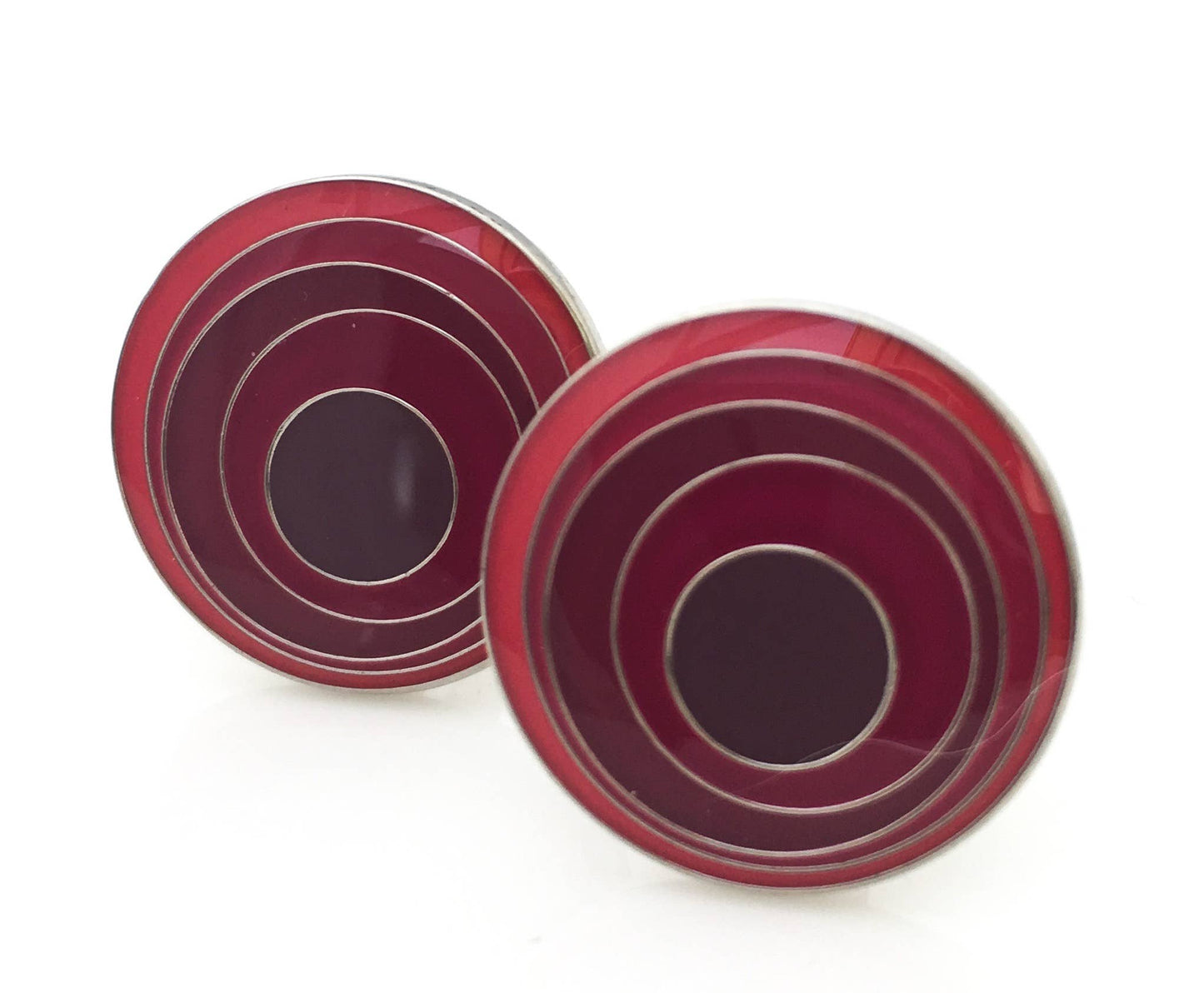 Round cufflinks with circles within circles in pinks