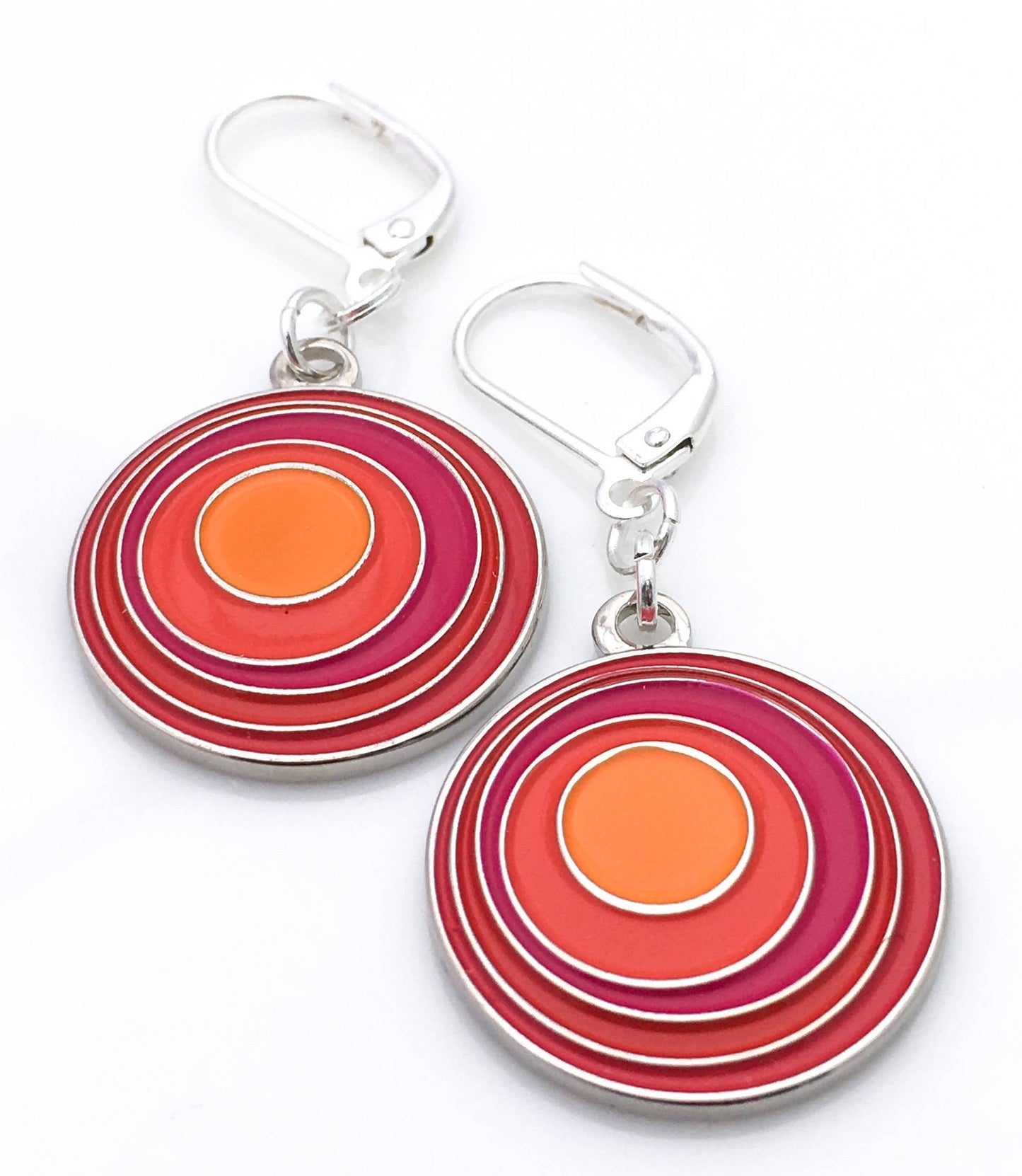 Round earrings with circles within circles in oranges
