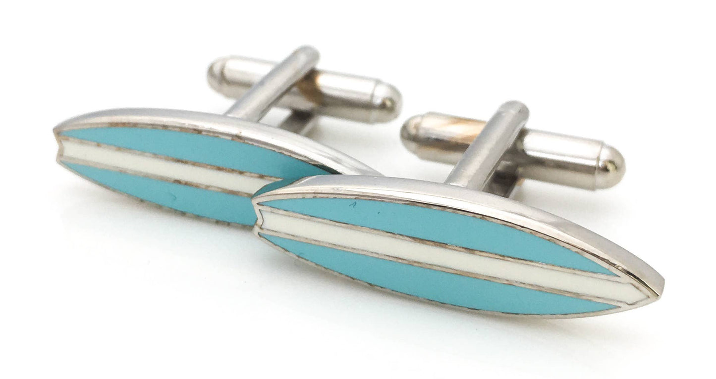 Load image into Gallery viewer, Surboard shaped cufflinks in blue enamel with a stripe down the center
