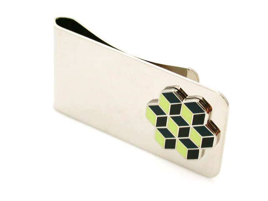 Money clip with enamel piece showing optical illusion of stacked black enamel cubes in an pentagon shape