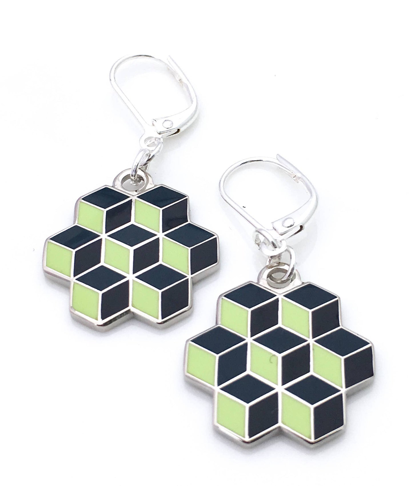 Earrings with optical illusion of stacked black enamel cubes in an pentagon shape