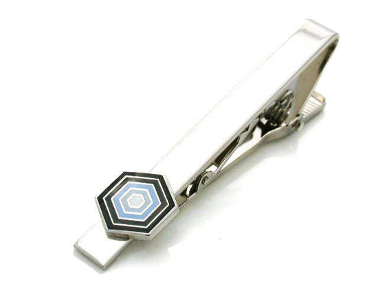 Honey comb shaped black and gray enamel piece on a tie clip