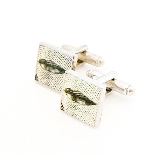 Square cufflinks with the lips of HRH from Canadian dollar bill