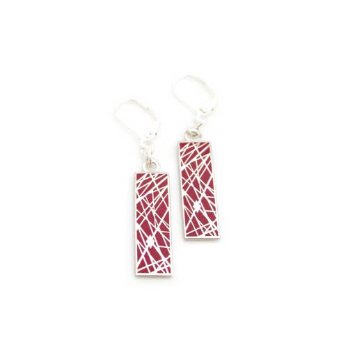 Red enamel earrings with pattern of interesecting lines