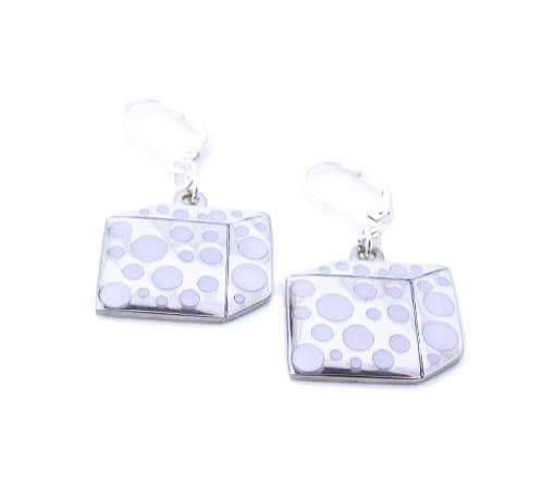 Cube shaped earrings with white enamel polka dots