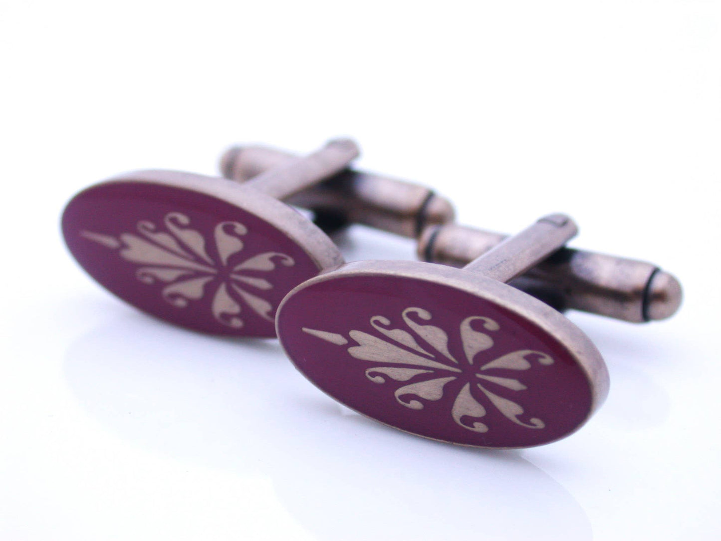 Load image into Gallery viewer, Antiqued gold oval cufflinks with fleur de lys pattern on wine enamel
