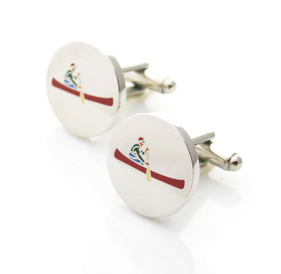 Round cufflinks with enamel canoe and paddler