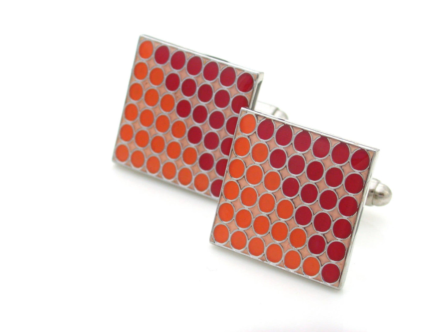 Enamel cufflinks with circles half on a diagonal orange and red