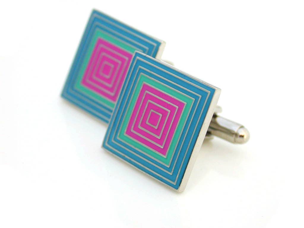 Cufflinks with a pattern of squares within squares blue and pink enamel