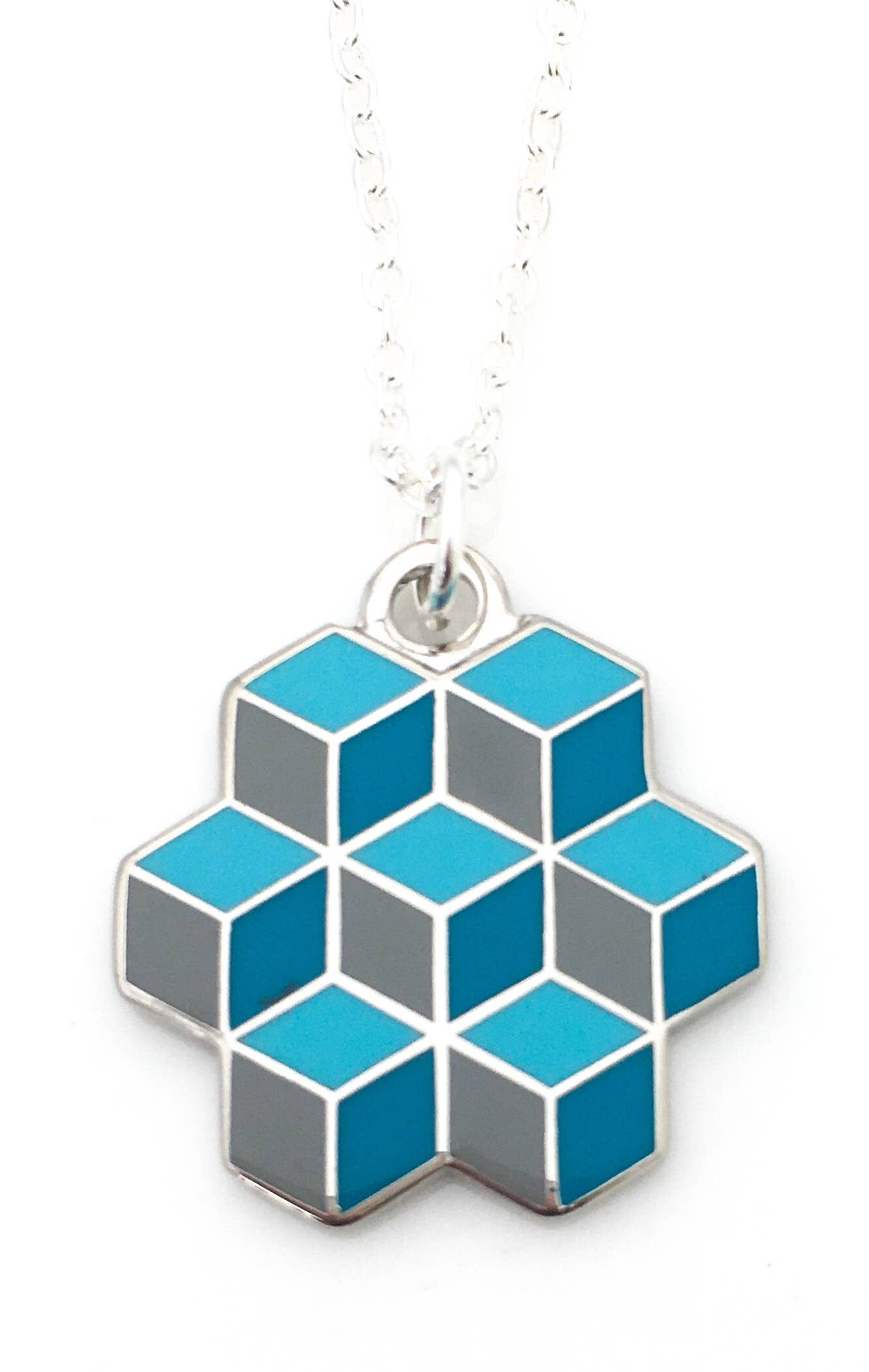 Optical illusion pendant of stacked blue enamel cubes in an pentagon shape