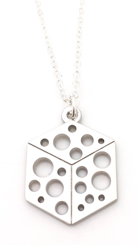 Cube necklace featuring cut-out holes.