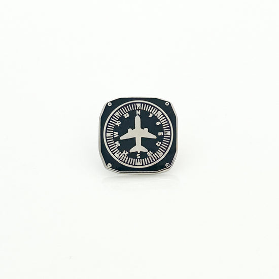 Flight Heading Indicator Pin featuring a detailed design inspired by aviation heading indicators, expertly crafted to celebrate the art of flying, making it a stylish accessory for aviation lovers.