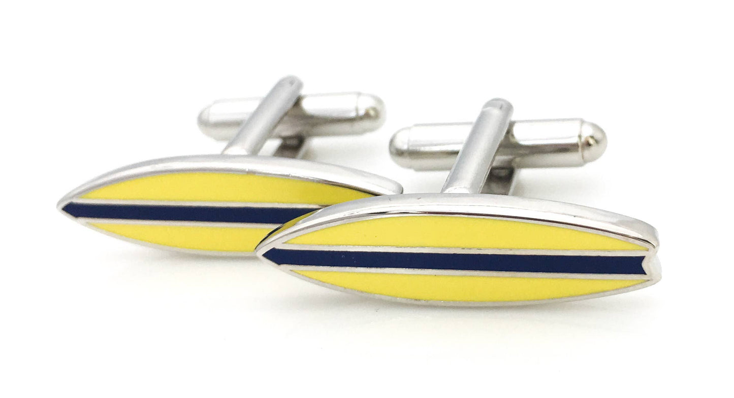 Surfboard shaped cufflinks in yellow enamel with a stripe down the centre