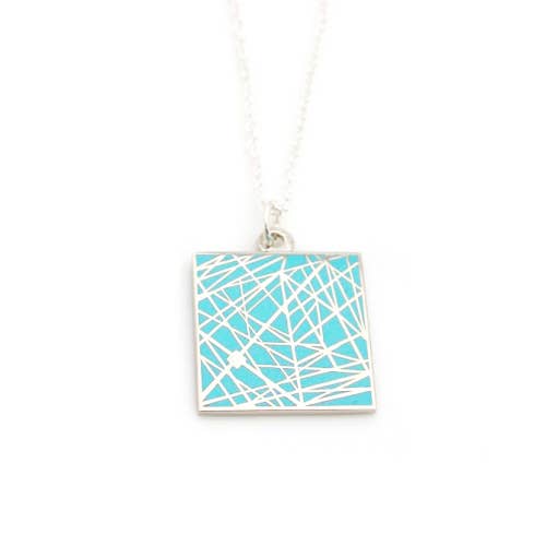 Light blue enamel necklace with pattern of interesecting lines
