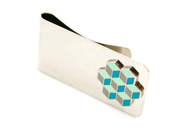 Money clip with enamel piece showing optical illusion of stacked blue enamel cubes in an pentagon shape
