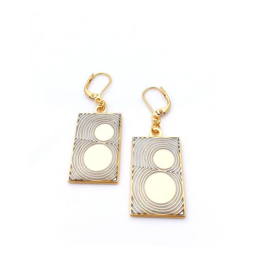 Gold and silver rectangular earrings with thin lines and curved