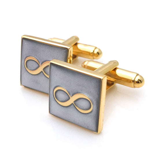 Small square cufflinks with a gold infinity symbol on a silver enamel
