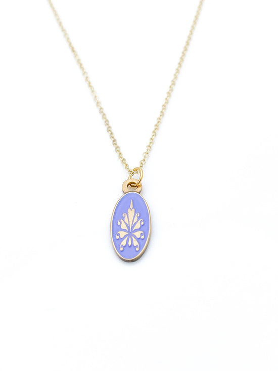 Antiqued gold oval necklace with fleur de lys pattern on lilac enamel