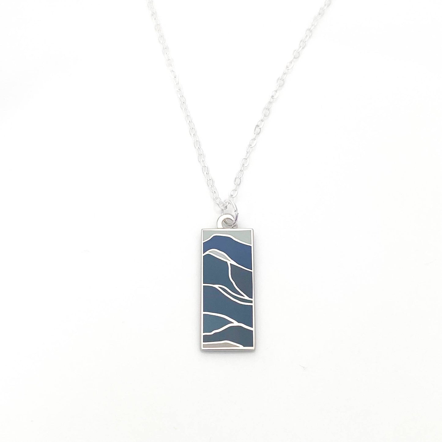 Square necklace with a waves of blue enamel