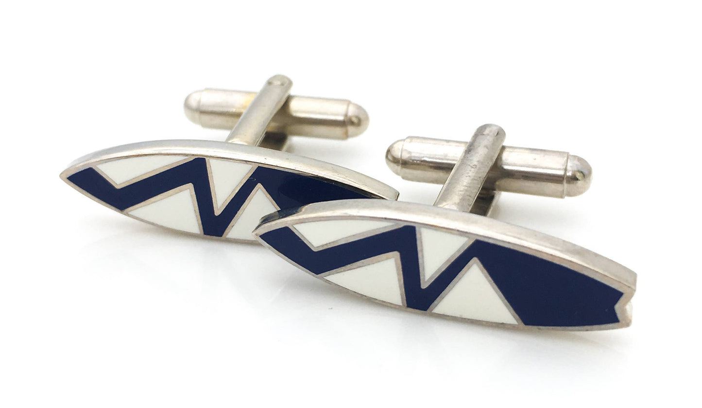Load image into Gallery viewer, Surboard shaped cufflinks in navy blue enamel with a zig zag pattern
