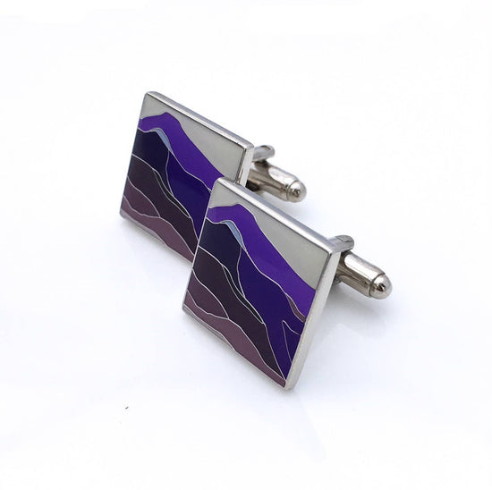 Round cufflinks with a waves of purple enamel