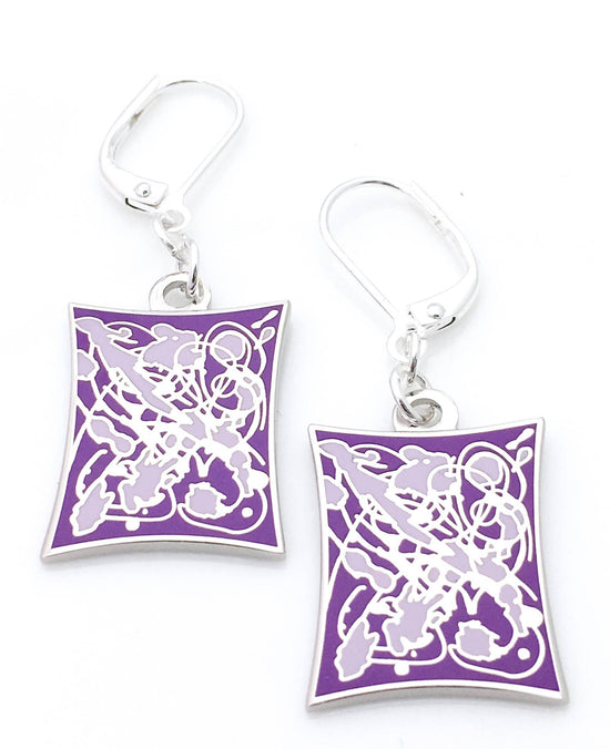 Earrings with a splatter design in purple