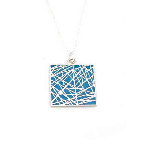 Blue enamel necklace with pattern of interesecting lines